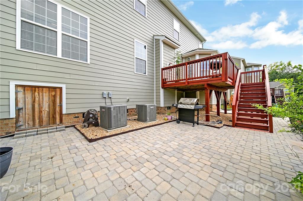 813 Bridge View Court Fort Mill, SC 29708 - Photo 37 of 42 a view of a chairs and table in the back yard of the house
