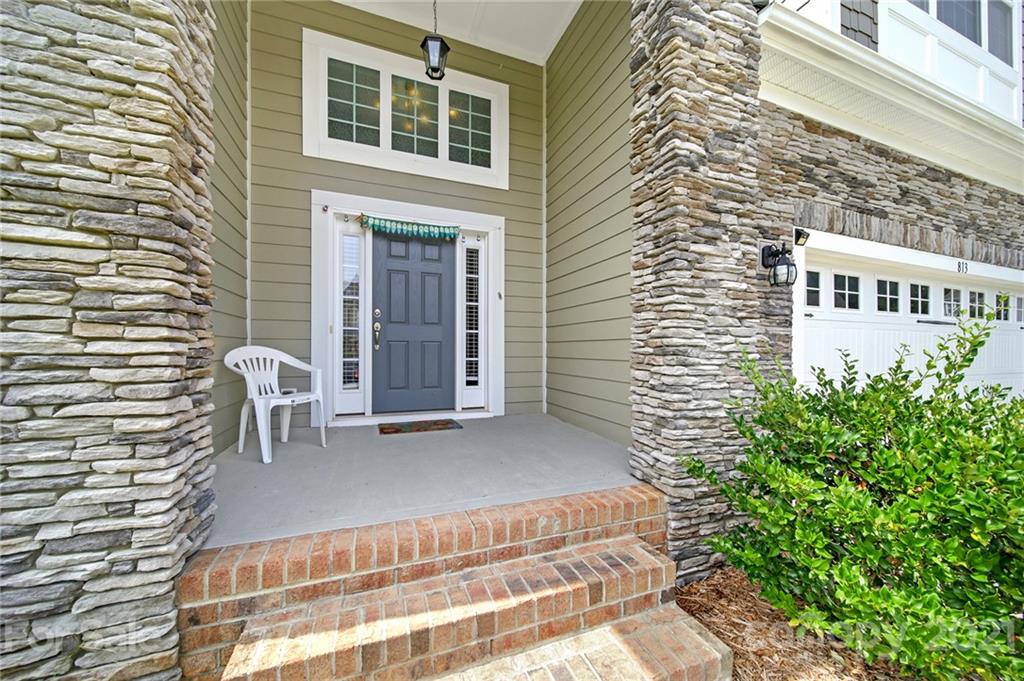 813 Bridge View Court Fort Mill, SC 29708 - Photo 42 of 42 a view of a patio with table and chairs and potted plants