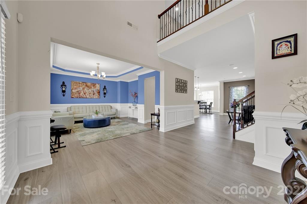 813 Bridge View Court Fort Mill, SC 29708 - Photo 6 of 42 a living room with furniture and wooden floor