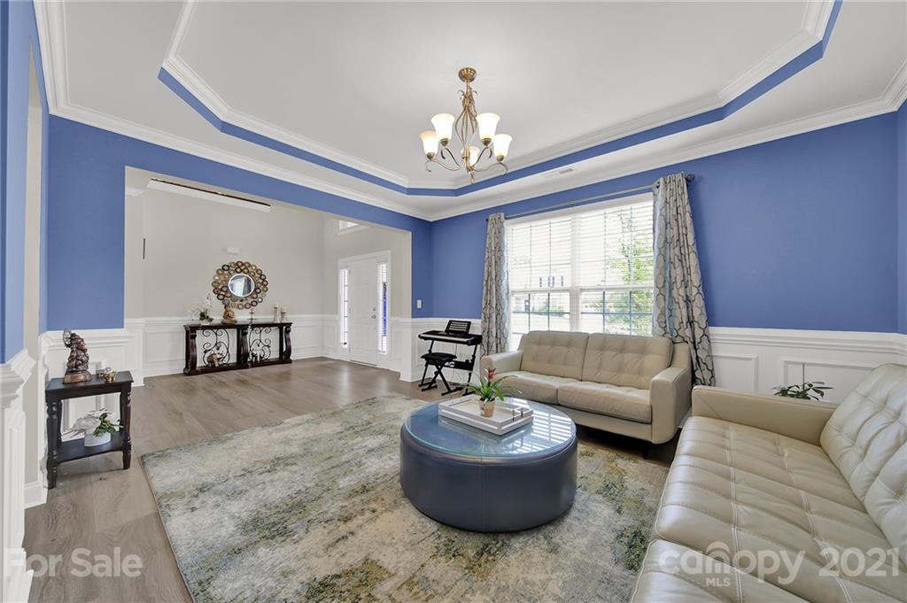 813 Bridge View Court Fort Mill, SC 29708 - Photo 8 of 42 a living room with furniture and a large window