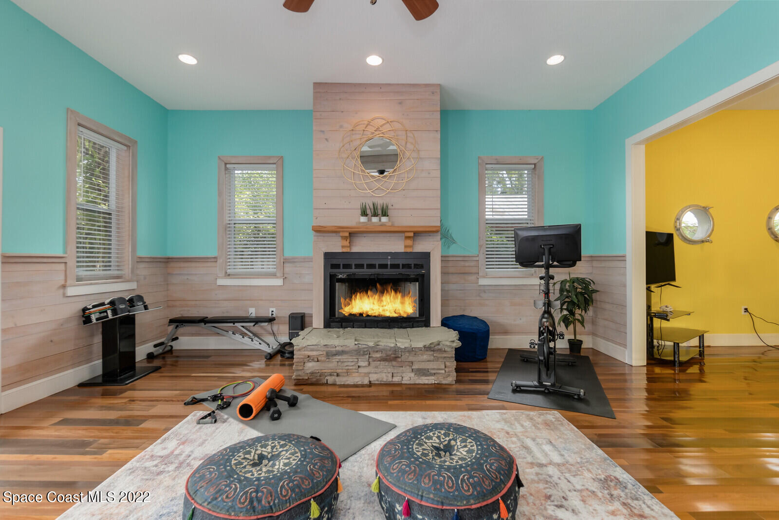 48 Vip Island Grant, FL 32949 - Photo 12 of 38 a living room with furniture and a fireplace