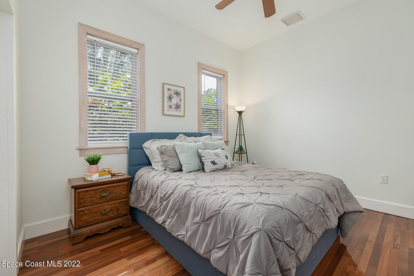 48 Vip Island Grant, FL 32949 - Photo 23 of 38 a bedroom with a bed and a window
