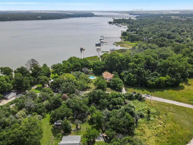 a view of a lake with a city
