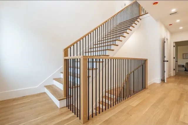 a view of a hallway with staircase