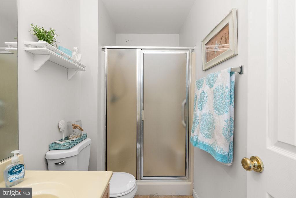 200 5th Street Colonial Beach, VA 22443 - Photo 18 of 45 Bright and airy bathroom with modern touches.