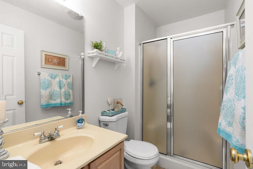 200 5th Street Colonial Beach, VA 22443 - Photo 19 of 45 Bright and airy bathroom with modern touches.