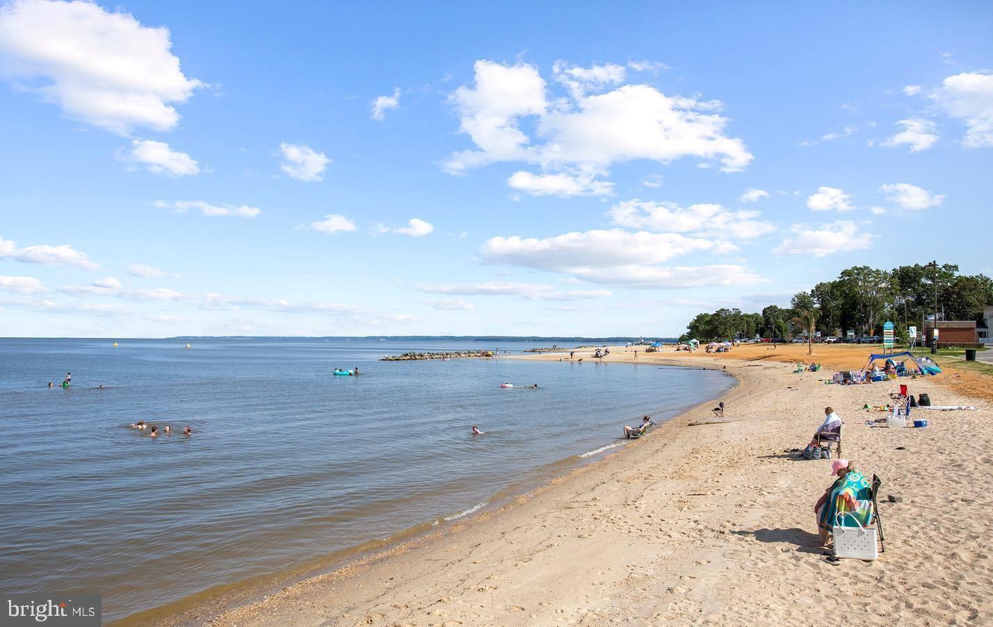 200 5th Street Colonial Beach, VA 22443 - Photo 31 of 45 Serene beach day under a bright blue sky.
