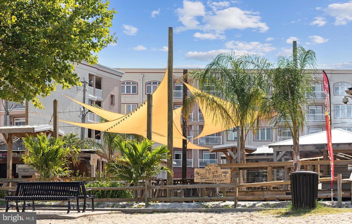 200 5th Street Colonial Beach, VA 22443 - Photo 37 of 45 Tropical retreat with vibrant shade sails.