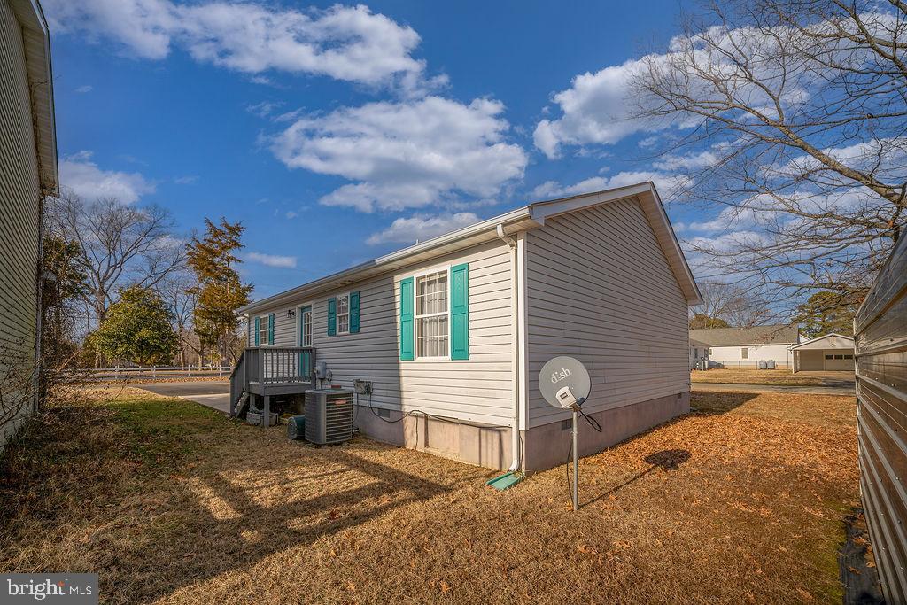 200 5th Street Colonial Beach, VA 22443 - Photo 5 of 45 Charming home with vibrant blue accents.