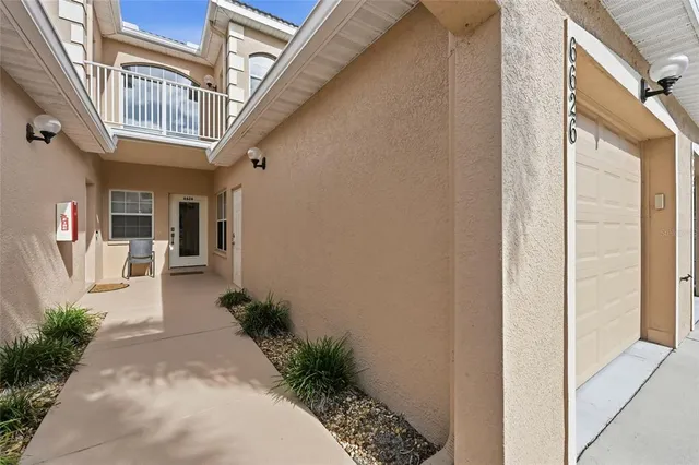 a front view of a house with swimming pool