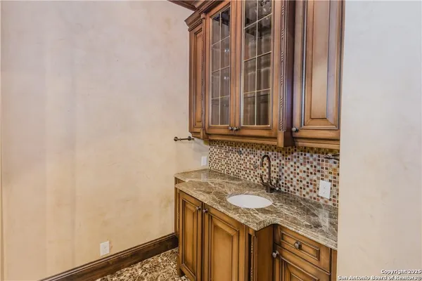 a bathroom with a shower and a toilet