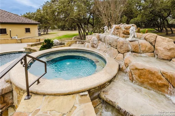 a view of a house with swimming pool