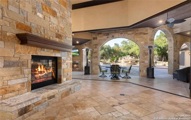 a kitchen with a stove a refrigerator and cabinets