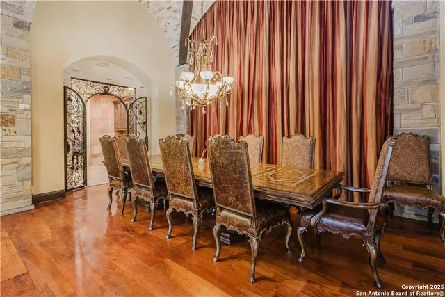 a view of barbeque area with wooden table