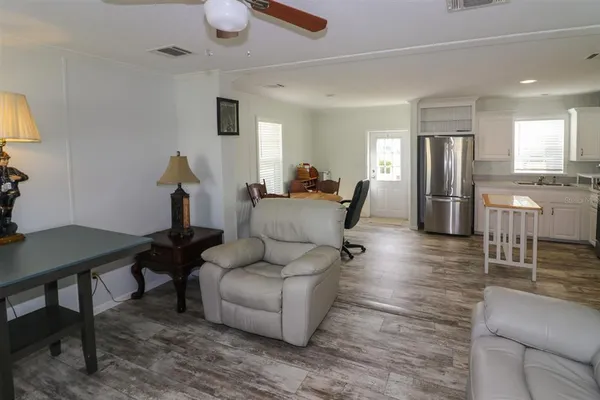 a living room with furniture and a table