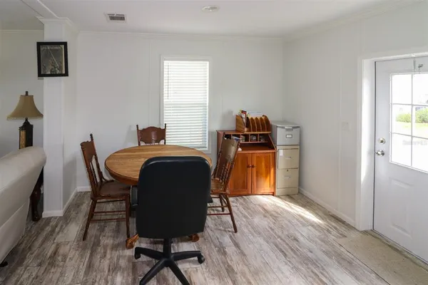 a view of a house with backyard