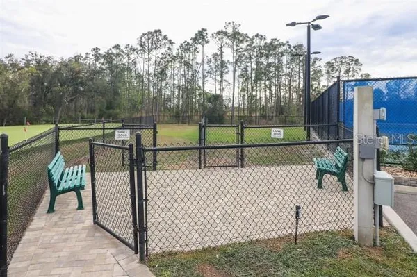 a view of a deck with a fence