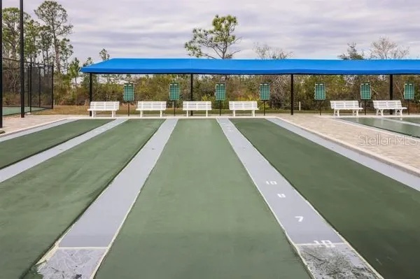 a view of a swimming pool with a patio