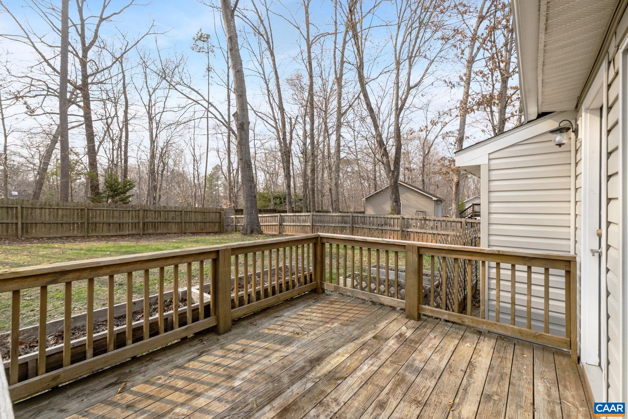 7 Riverside Drive Palmyra, VA 22963 - Photo 20 of 26 a view of balcony with wooden floor and fence