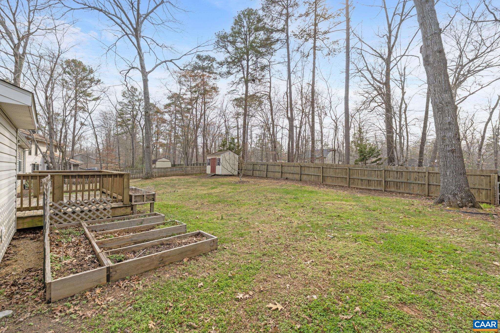 7 Riverside Drive Palmyra, VA 22963 - Photo 22 of 26 a view of a yard with wooden fence