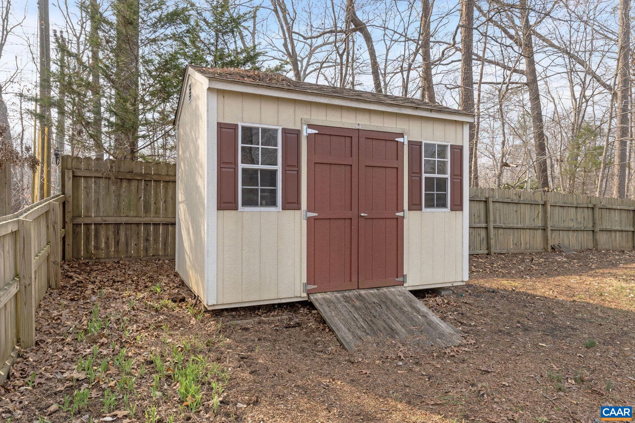 7 Riverside Drive Palmyra, VA 22963 - Photo 23 of 26 a view of a house with a door and wooden fence