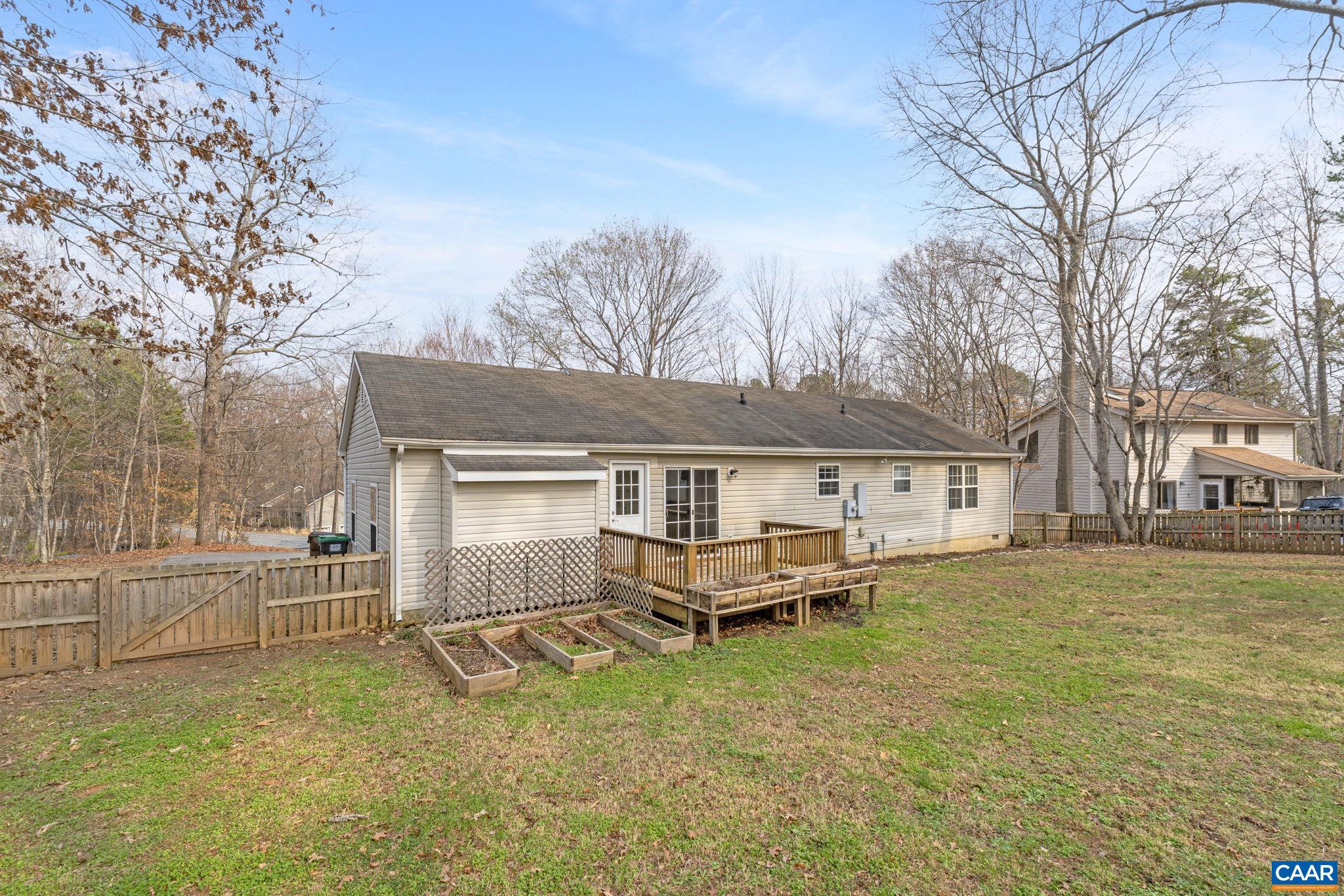 7 Riverside Drive Palmyra, VA 22963 - Photo 26 of 26 a view of a house with backyard and a tree