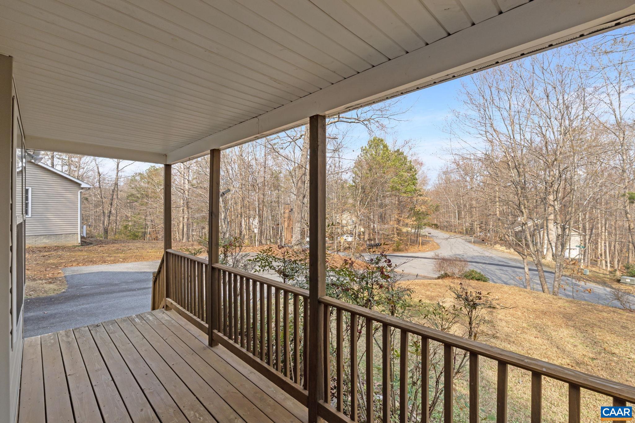 7 Riverside Drive Palmyra, VA 22963 - Photo 5 of 26 a view of a room with wooden floor and wooden fence