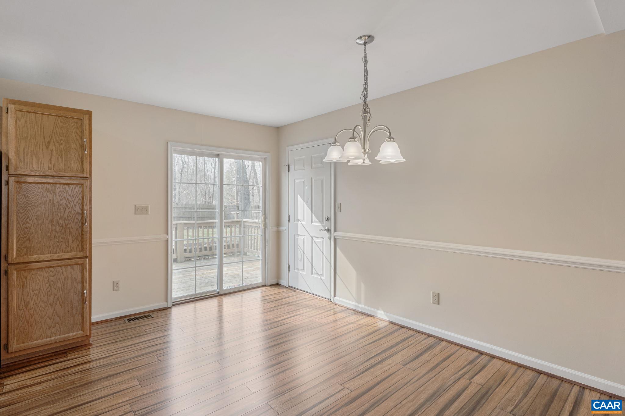 7 Riverside Drive Palmyra, VA 22963 - Photo 7 of 26 a view of empty room with wooden floor and fan