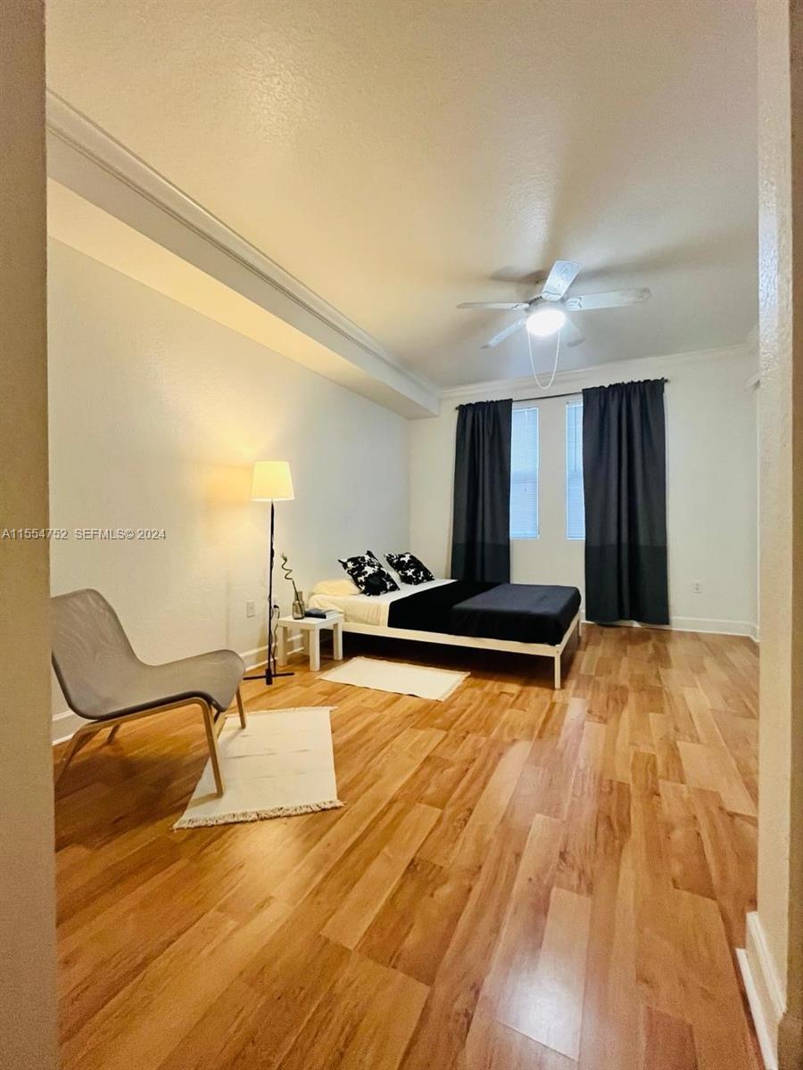 1121 Renaissance Way, Unit 1121 Boynton Beach, FL 33426 - Photo 20 of 26 a living room with patio furniture