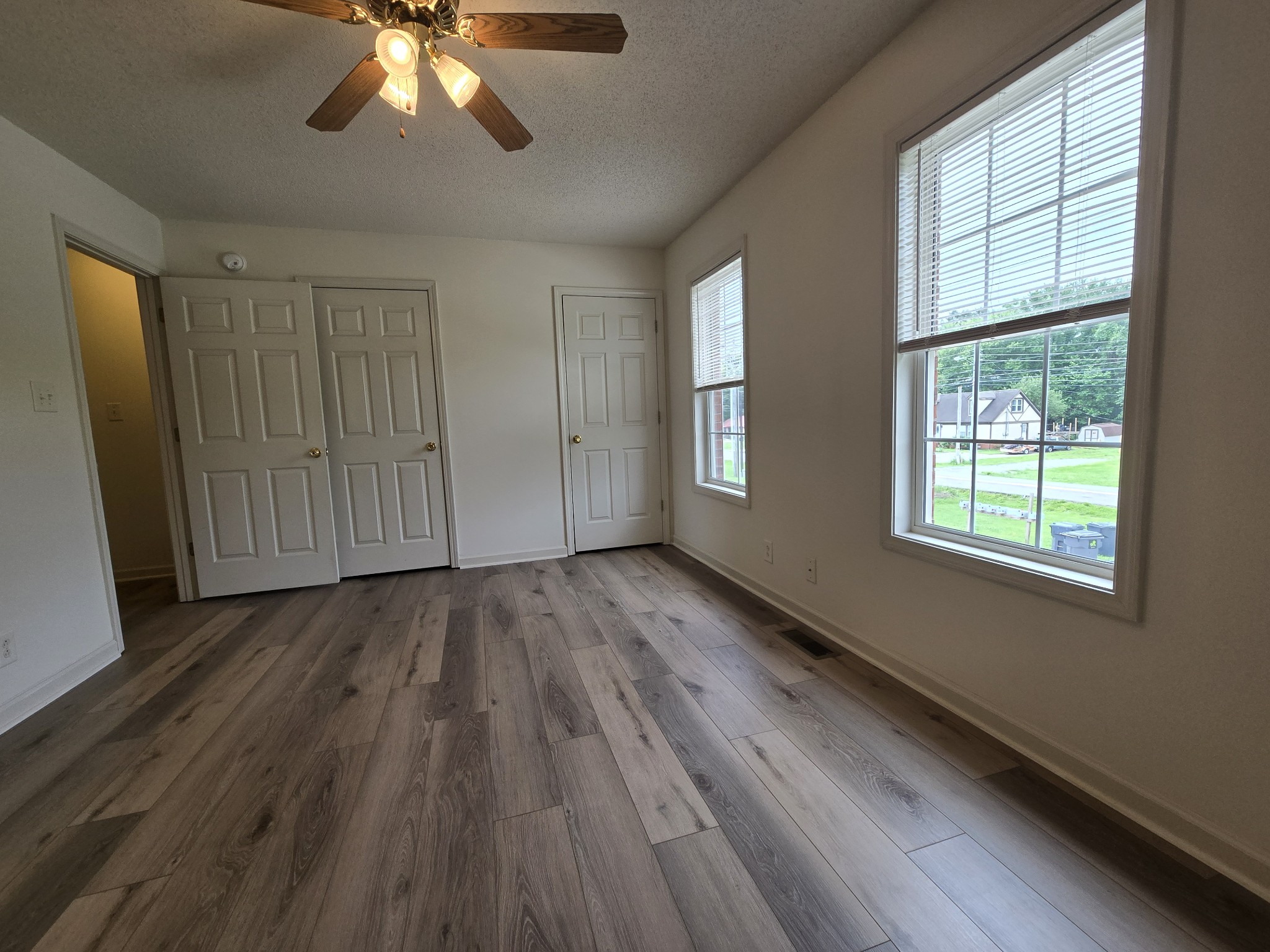237 State Line Road Oak Grove, KY 42262 - Photo 15 of 20 a view of an empty room with wooden floor and a window