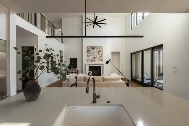 a view of a hallway with windows