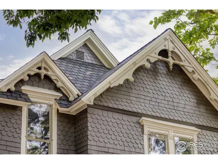 a view of roof deck with furniture and garden