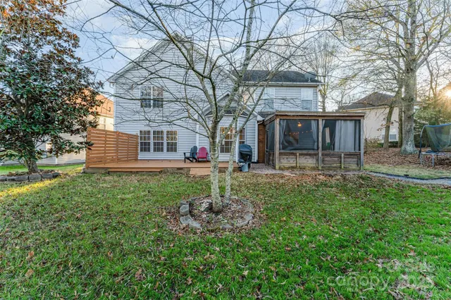 a backyard of a house with seating space