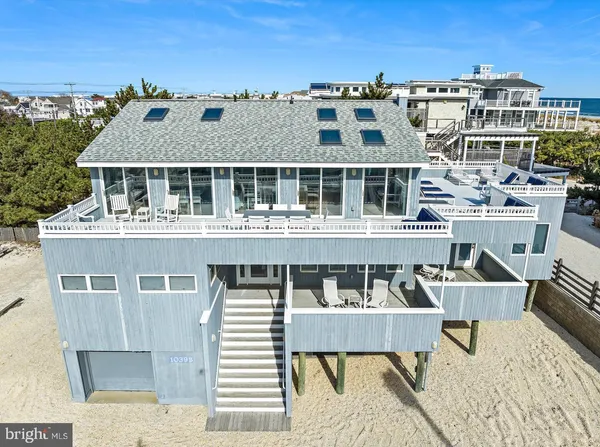 a front view of a building with a porch