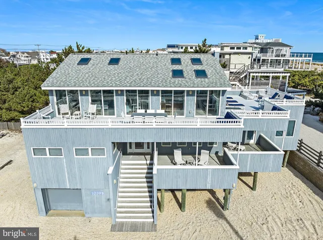 a front view of a building with a porch