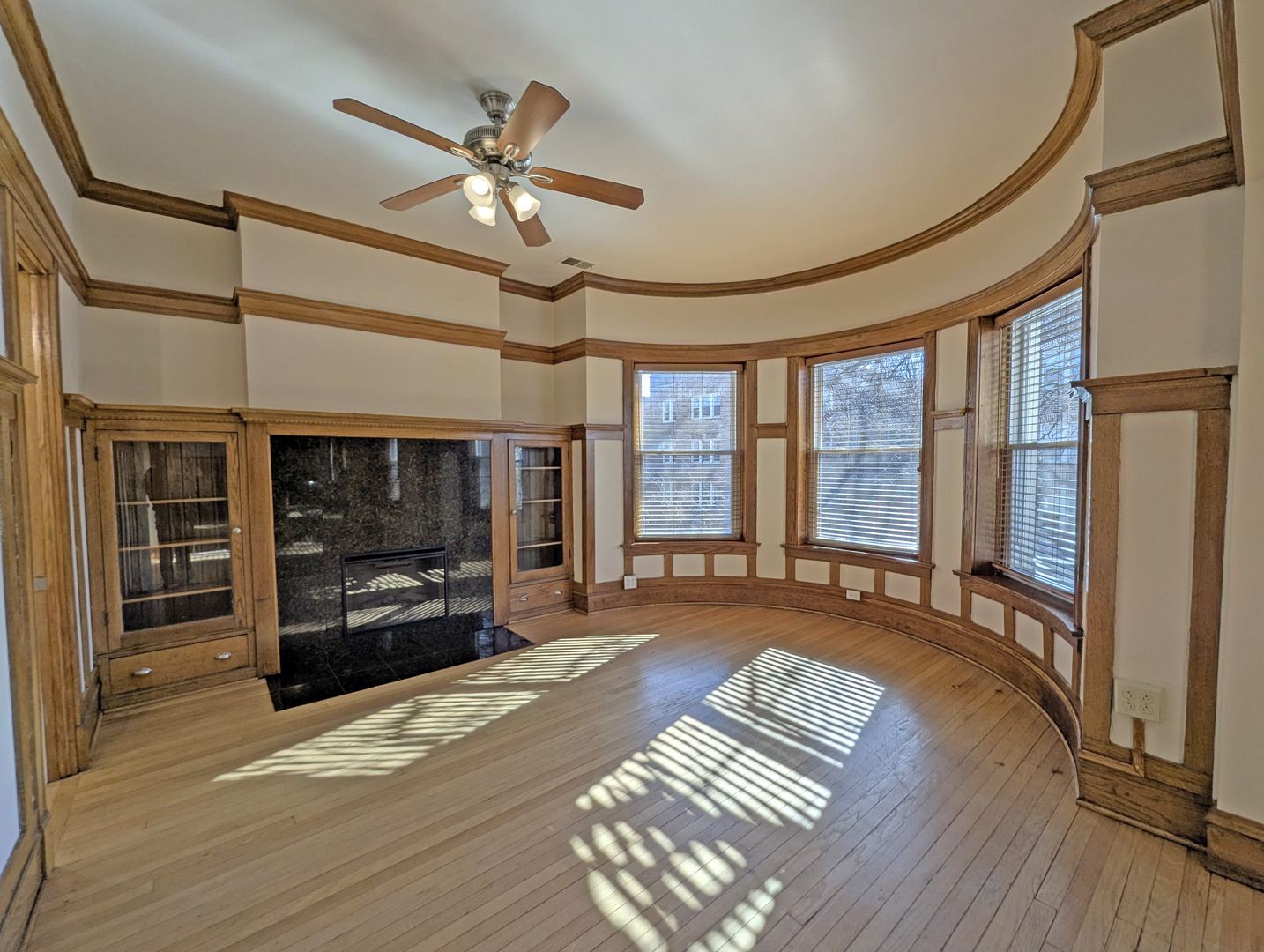 836 East 52nd Street Chicago, IL 60615 - Photo 23 of 43 a view of an empty room with wooden floor and a window