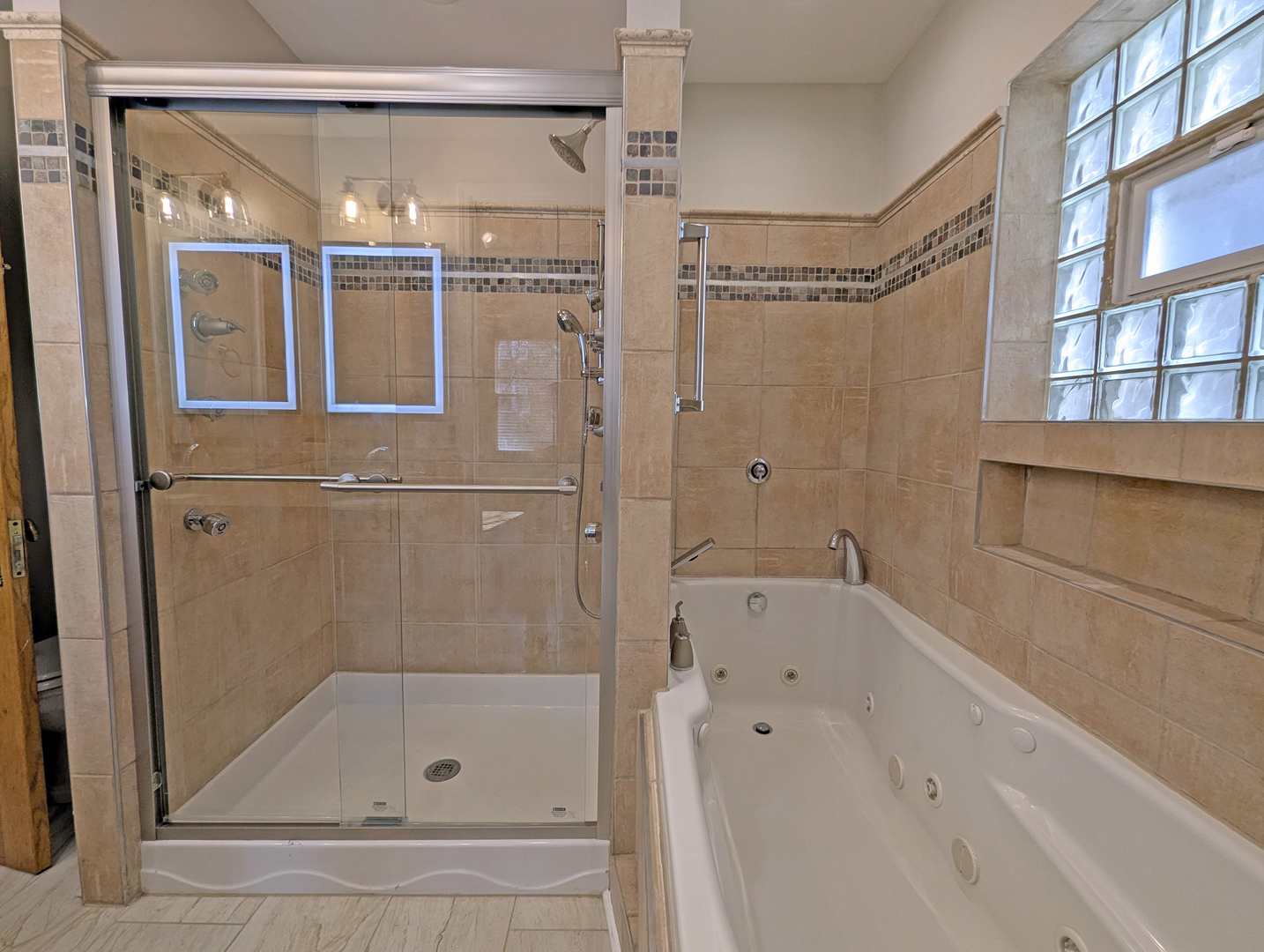 836 East 52nd Street Chicago, IL 60615 - Photo 28 of 43 a bathroom with a bathtub and a shower