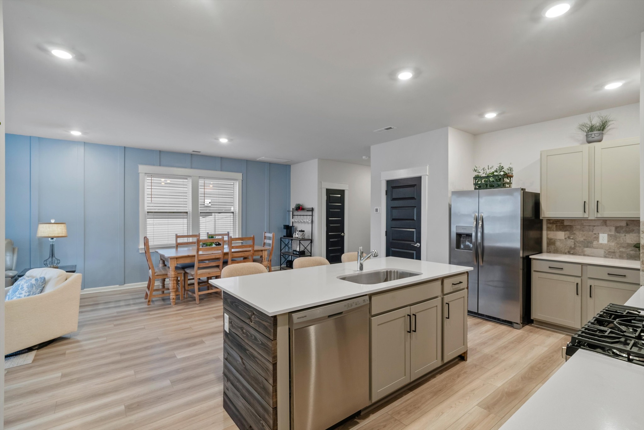 562 Torrey Pines Lane Lebanon, TN 37087 - Photo 12 of 38 a kitchen with a sink stove and refrigerator