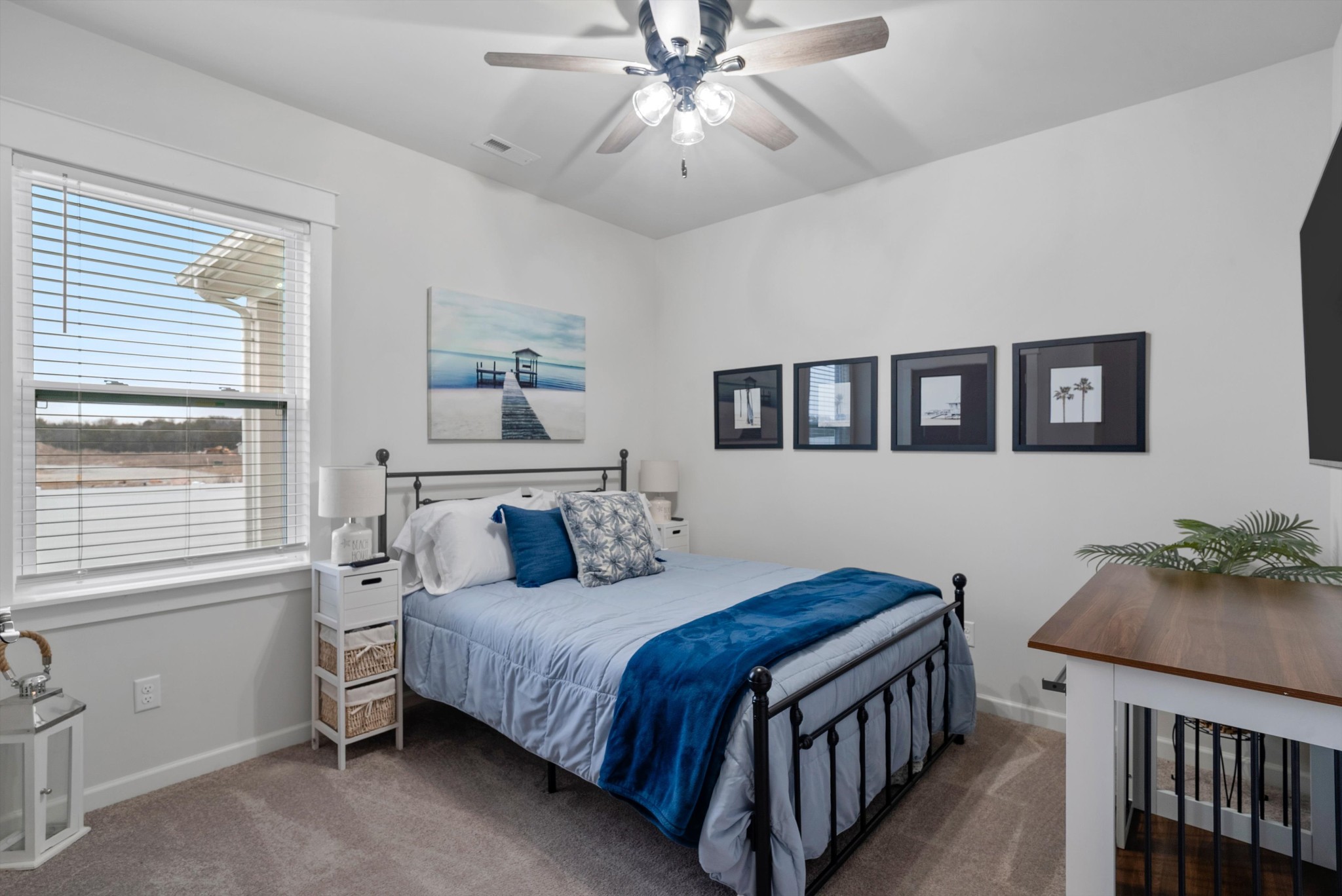 562 Torrey Pines Lane Lebanon, TN 37087 - Photo 14 of 38 a bedroom with a bed and a chandelier