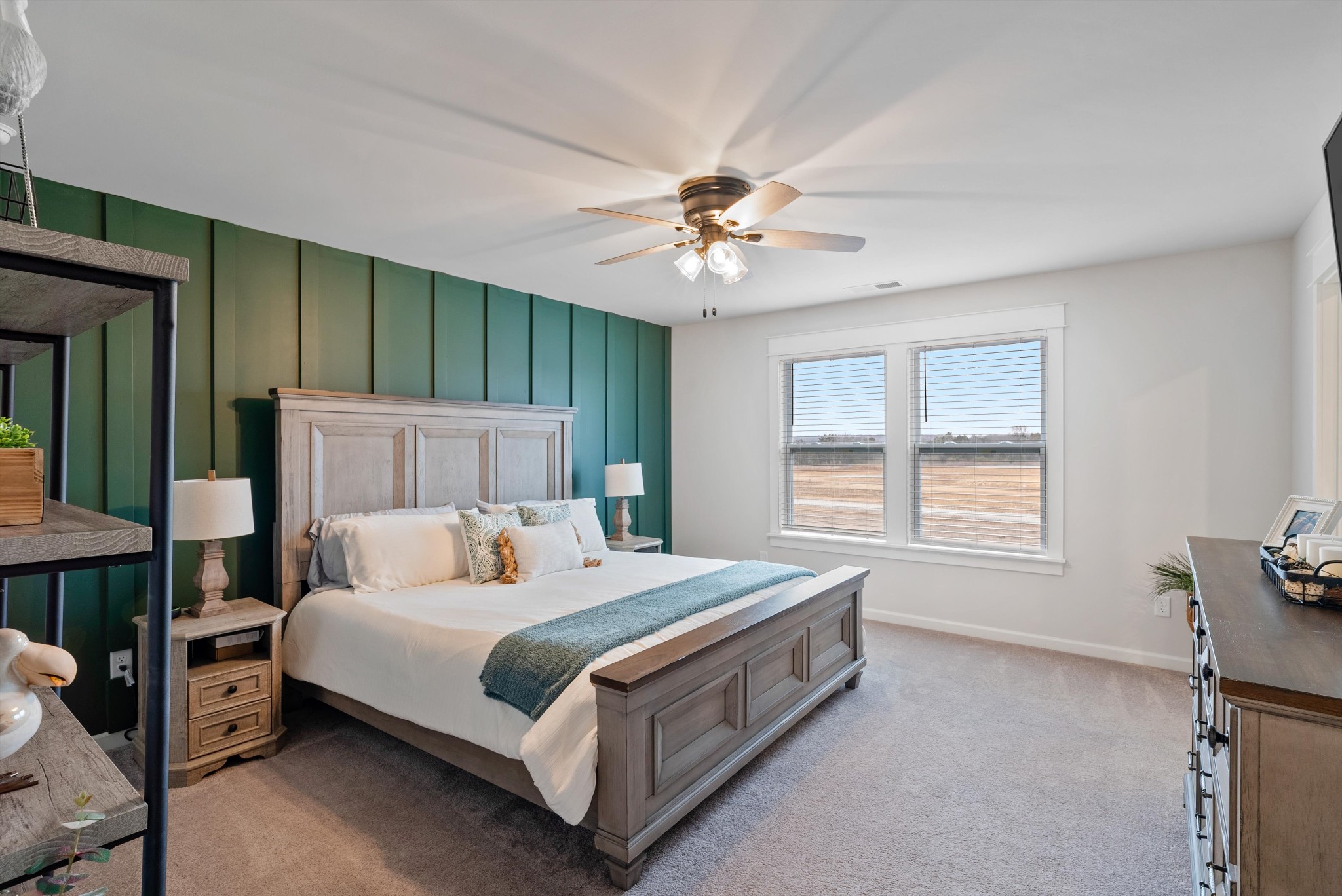 562 Torrey Pines Lane Lebanon, TN 37087 - Photo 17 of 38 a bedroom with a bed lamp and a window