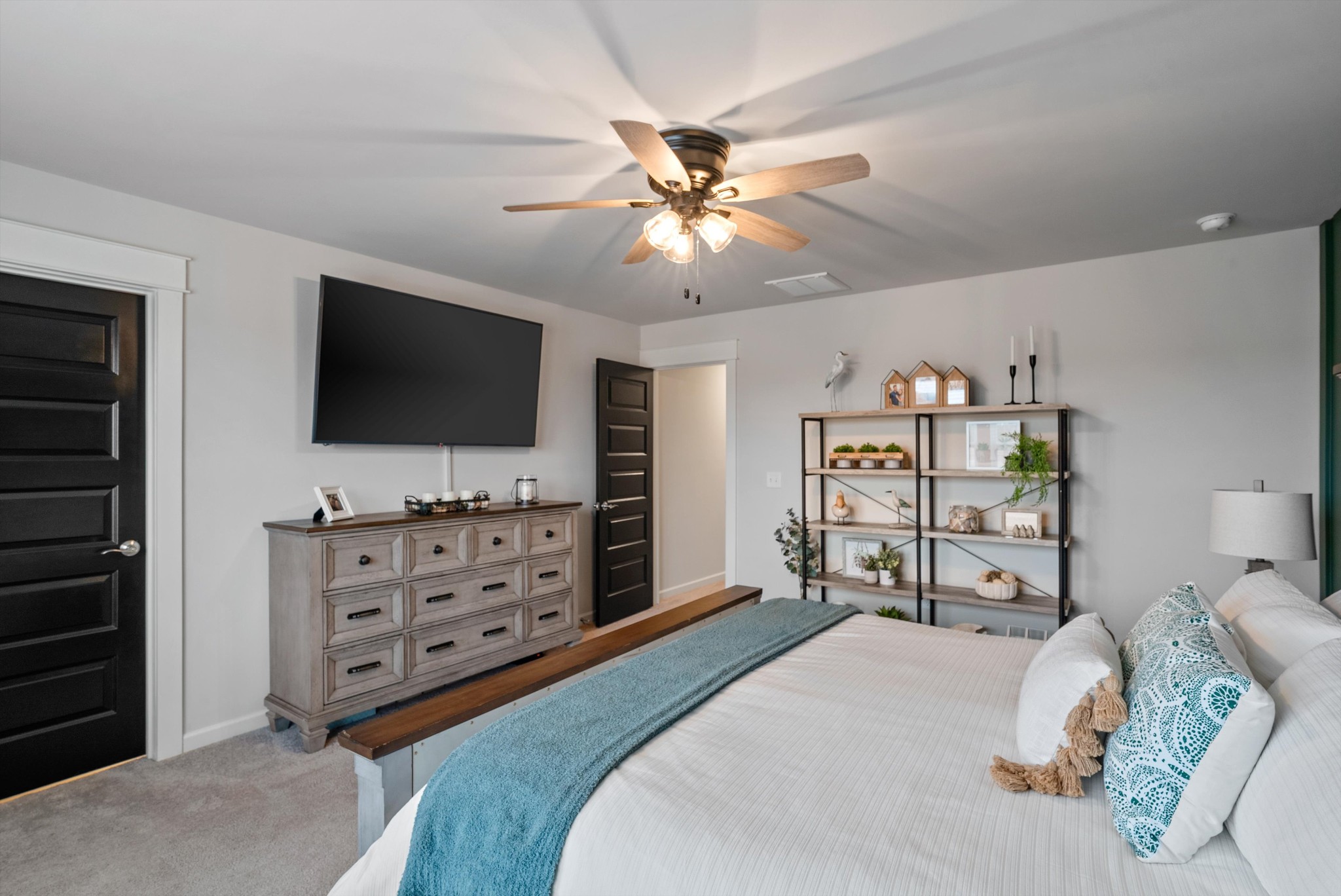 562 Torrey Pines Lane Lebanon, TN 37087 - Photo 18 of 38 a bedroom with furniture and a flat screen tv