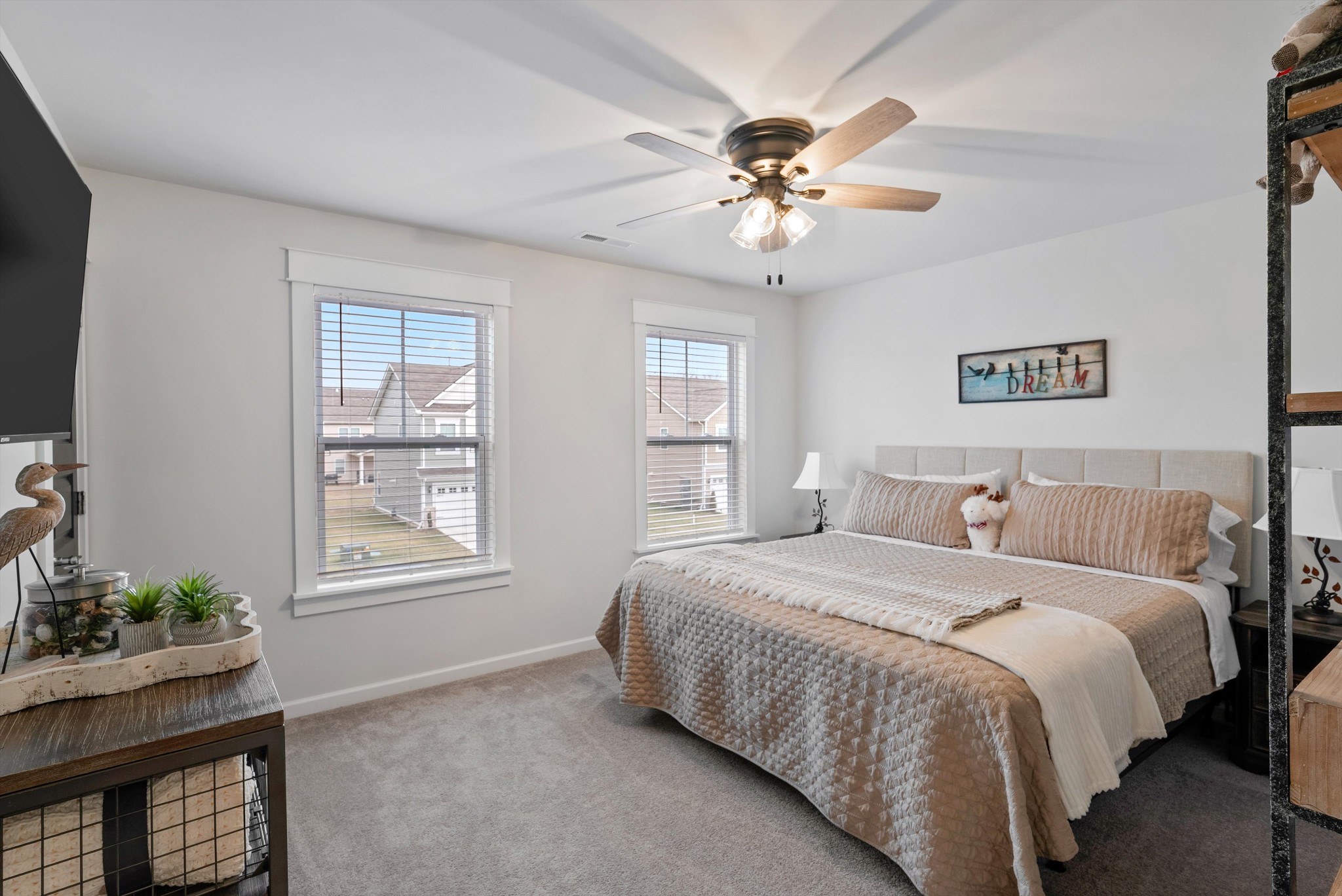 562 Torrey Pines Lane Lebanon, TN 37087 - Photo 25 of 38 a bedroom with a large bed and a window