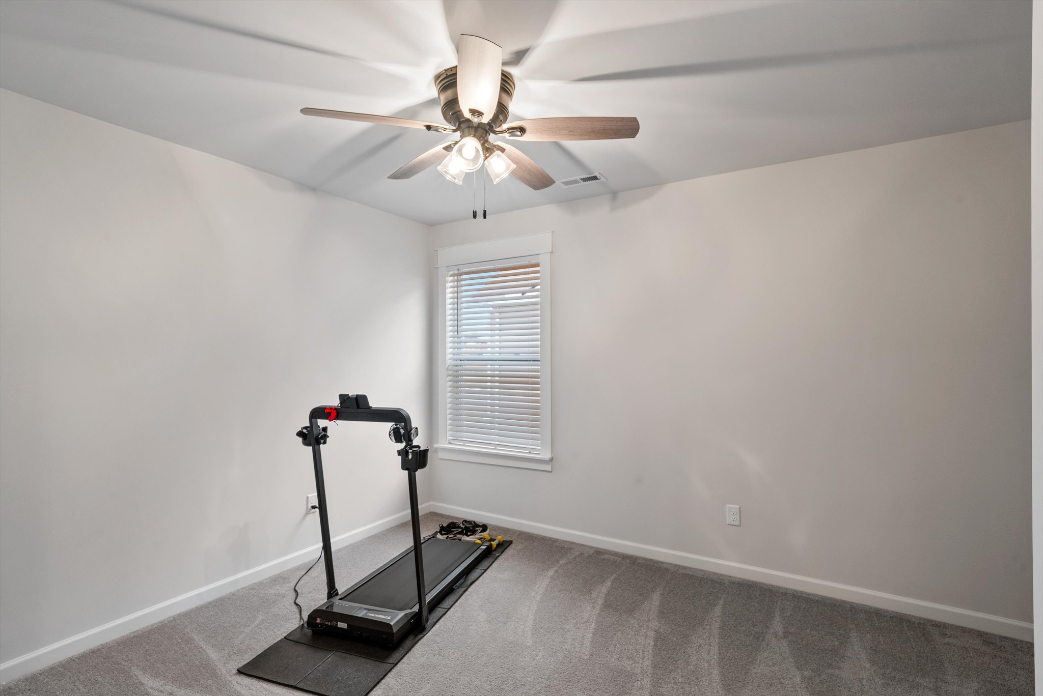 562 Torrey Pines Lane Lebanon, TN 37087 - Photo 28 of 38 a view of a room with gym equipment