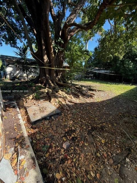 655 Southwest 6th Terrace Florida City, FL 33034 - Photo 6 of 15 a view of outdoor space with garden