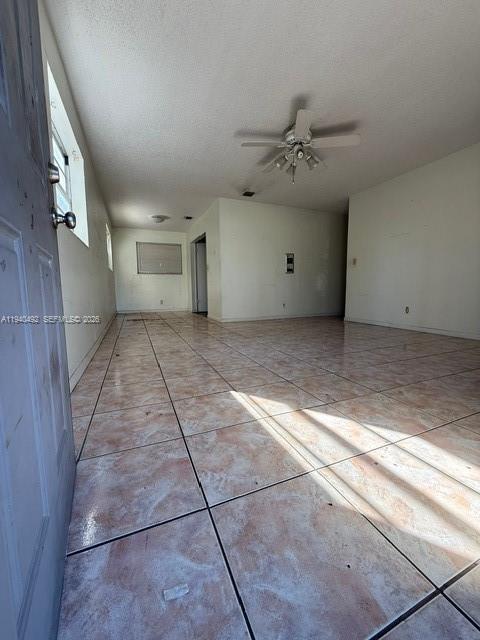 655 Southwest 6th Terrace Florida City, FL 33034 - Photo 10 of 15 a view of a livingroom with a ceiling fan and window