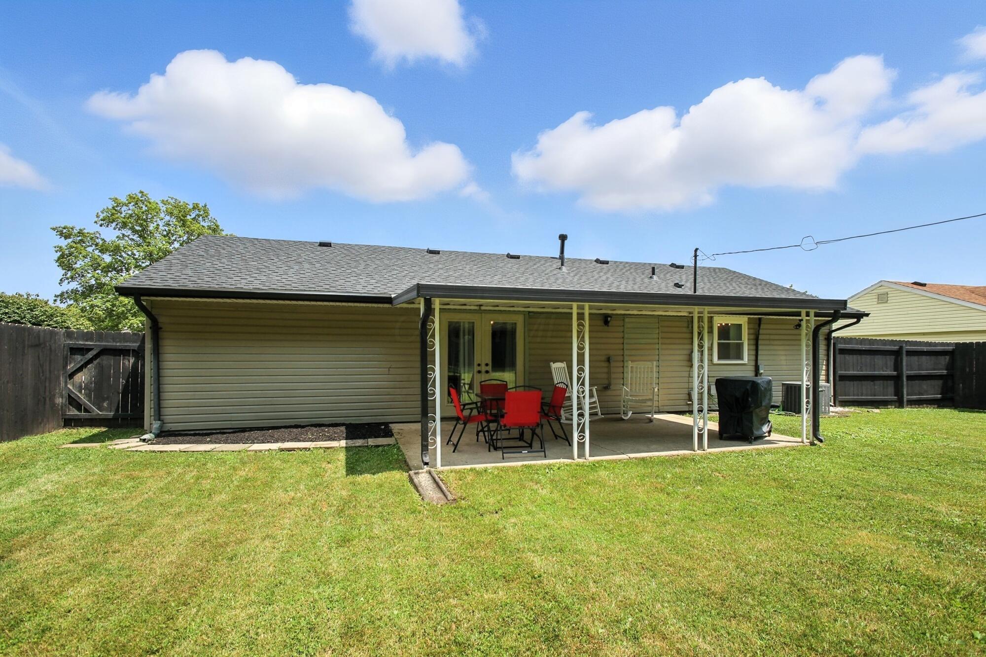 3139 Woonsocket Street Springfield, OH 45503 - Photo 24 of 35 Large Fenced Yard with Covered Patio