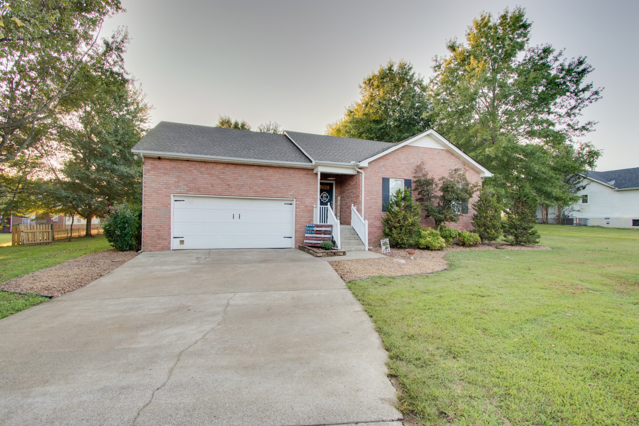 1206 Bates Road Lebanon, TN 37087 - Photo 3 of 31 a front view of a house with a yard and garage