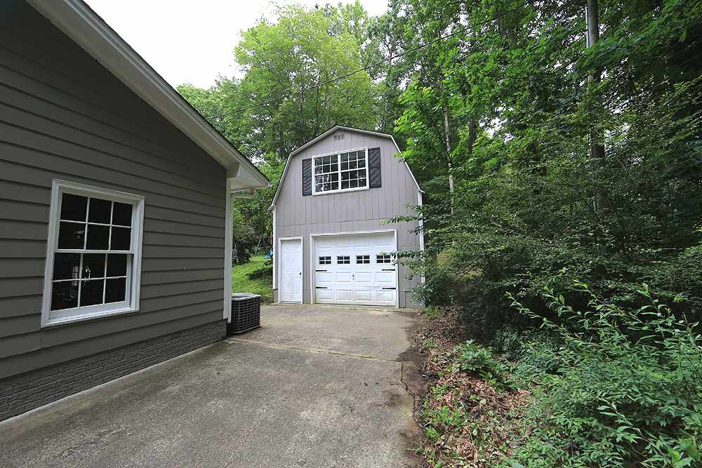 6004 Spring Valley Drive Raleigh, NC 27616 - Photo 16 of 25 For those who have hobbies or an extra vehicle or motorcycle, this is a great space. Additional Garage