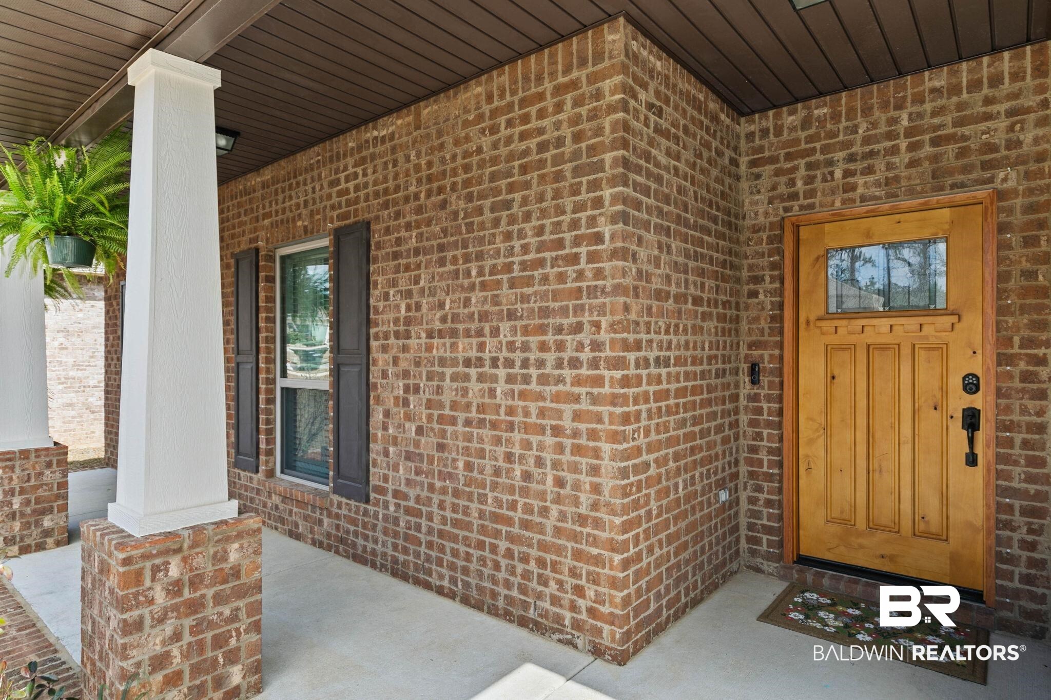 31350 Hoot Owl Road Daphne, AL 36527 - Photo 6 of 94 Property entrance with covered porch and brick siding