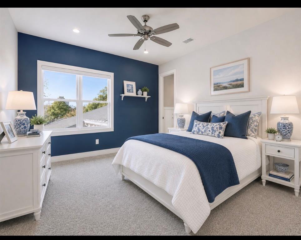 7912 Hanover Street Dallas, TX 75225 - Photo 4 of 29 AI ImageSpacious room featuring a large window, a ceiling fan, plush carpet, and a prominent accent wall